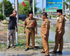 Bupati Zukri Perintah Tim Satgas Atasi Banjir di Beberapa Ruas Jalan di Pangkalan Kerici
