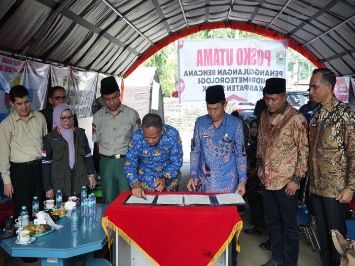 Kampar–Solok Teken  MoU Penyediaan dan Pendistribusian Beras Bantuan Sosial