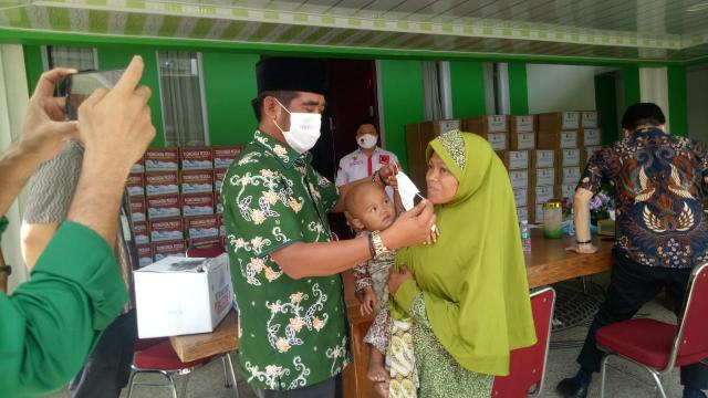 Peduli Covid 19, PW NU Riau Kembali Sambangi Rumah Warga Kurang Mampu
