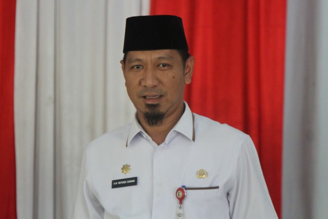 Disdukcapil Kuansing Serahkan 69 KTP el di Desa Teberau Panjang