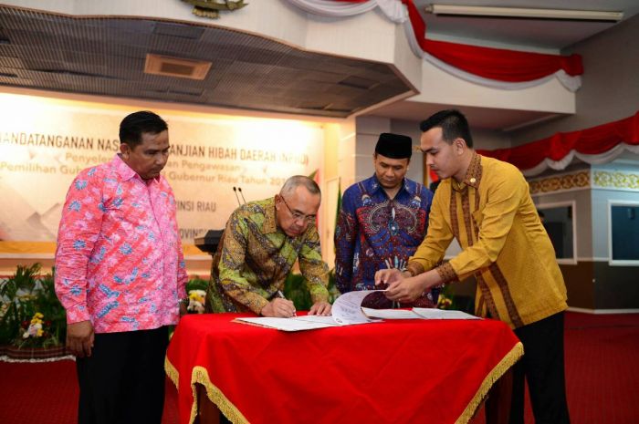 Gubri Teken NPHD, Pemprov Setujui Biaya Pilkada Riau 2018 Rp408 Miliar