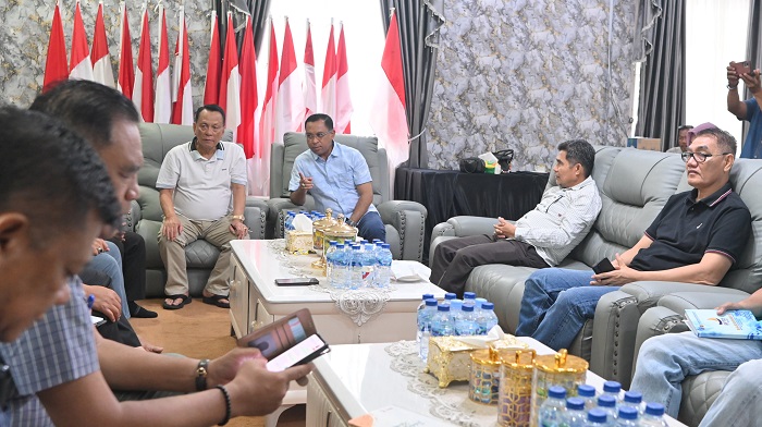 Bupati Rohil Pimpim Rakor Pendistribusian Bantuan Bencana Sumatera