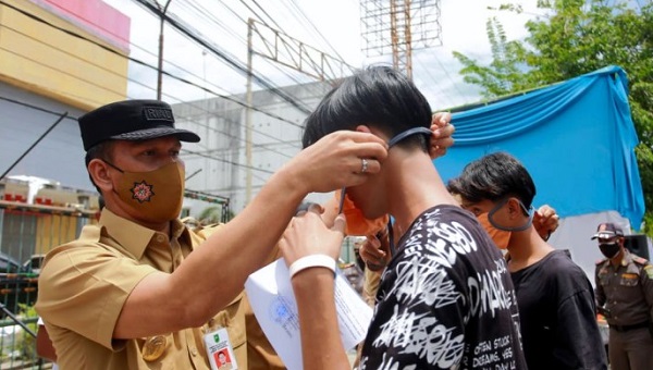 Pjs Bupati Siak Sosialisasikan Penindakan Disiplin Non Yustisi Protokol Kesehatan di Kec Tualang