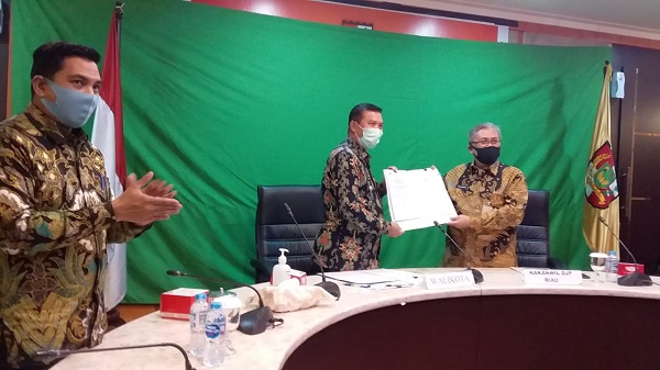 MoU Optimalisasi Pungutan Pajak Pusat Daerah, Ini Target Optimis Bapenda Pekanbaru ke Depan...