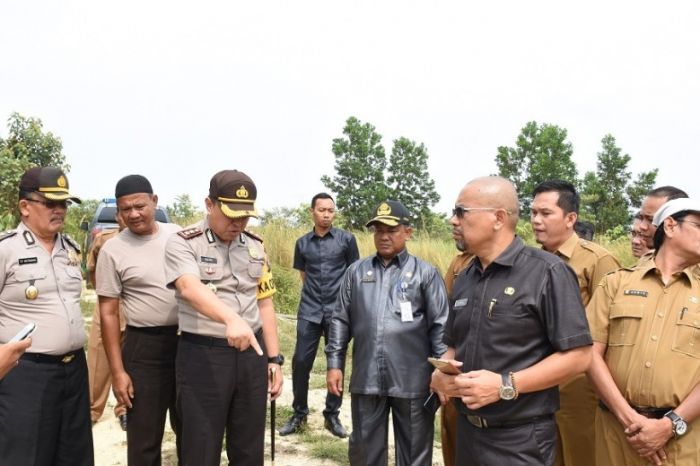 Sekda dan Polres Kampar Tinjau Lahan Pembangunan SPN di Tambang
