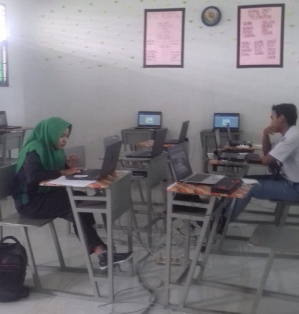 Gelar UNBK 2019, SMK N 1 Rambah Samo Pinjam Laptop Siswa