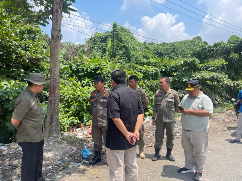 Sejumlah TPS Liar di Pekanbaru Ditimbun dengan Tanah