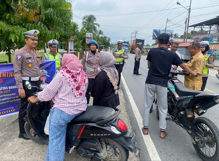Operasi Patuh Lancang Kuning 2023, Sat Lantas Polres Kuansing Ajak Tokoh Adat dan Bagi Sembako