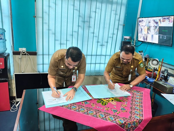Tingkatkan Kualitas Pelayanan Publik, Disperkimtan Bengkalis Tandatangani Kerja Sama Pemanfaatan Data Kependudukan dengan Disdukcapil