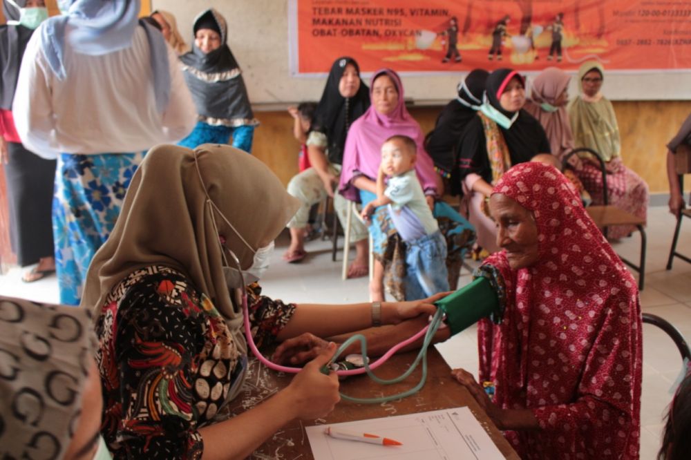 Dompet Dhuafa Riau dan Komunitas Tangan Diatas Beri Layanan Kesehatan Gratis