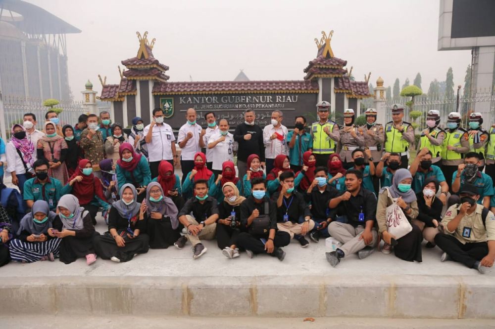 Diskominfotik Riau dan Satlantas Pekanbaru Sebarkan 5000 Masker