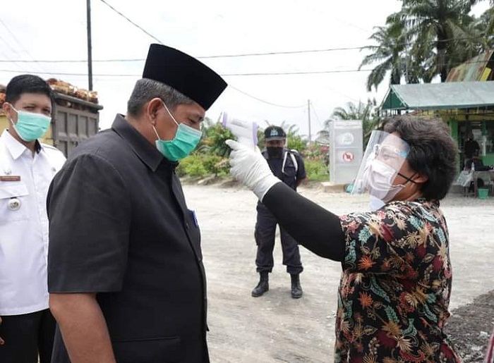 Cegah COVID-19, Bupati Alfedri Minta Perusahaan Jalani Protokol Kesehatan