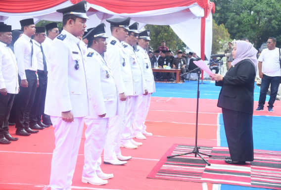Bupati Kasmarni Kukuhkan Perpanjangan Kades dan BPD Kecamatan Pinggir dan Talang Muandau Secara Serentak