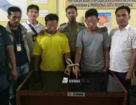 Polisi Bekuk Pengedar Narkoba di Kuok