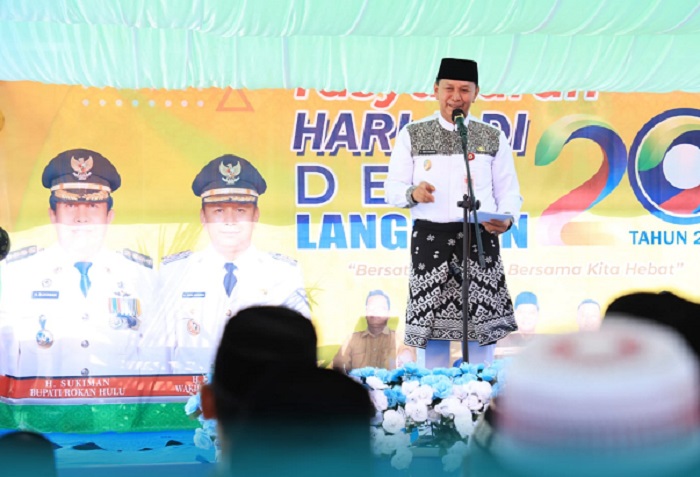 HUT Desa Langkitin Ke 20, Wabup Indra Gunawan Resmikan Aplikasi Pintu Desa
