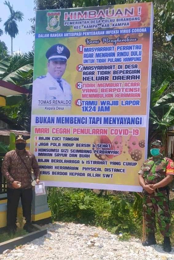Ikuti Instruksi Pemkab Kampar, Desa Pulau Birandang Sosialisasi Bahaya Covid-19 