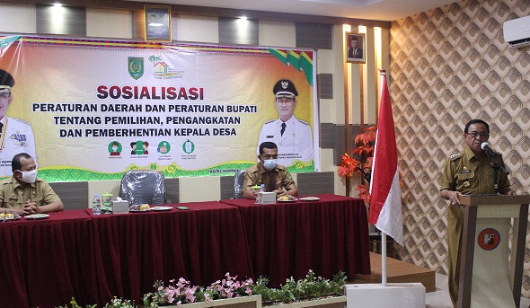 Hadiri  Sosialisasi Perda Pilkades, Bupati HM Wardan Targetkan Sukses Administrasi dan Penyelenggaraan