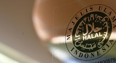 MUI Minta Pemerintah Cabut Perpres Investasi Miras