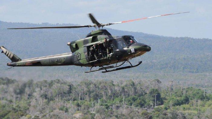 MENCEKAM... Helikopter TNI Juga Diserang KKB saat Evakuasi Jenazah Anggota TNI Korban Penembakan di Papua