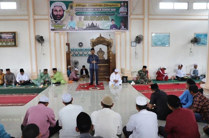 Pj Bupati Inhil Hadiri Haul Syekh Saman Al Madani di Desa Junjangan